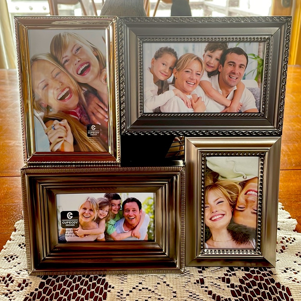 NWT Picture frame. Gold and silver tones. In original box. GREAT GIFT.